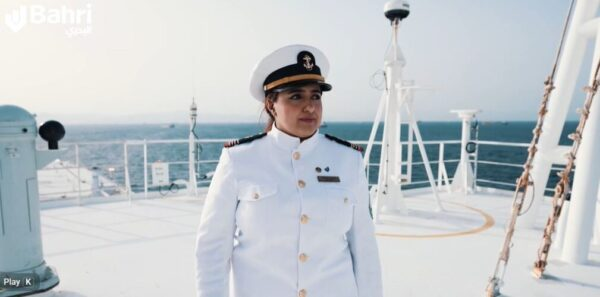 Women in Maritime Leadership on Bahri Vessel Women in Maritime leader standing on a Bahri vessel deck, representing innovation, leadership, and progress in the global shipping industry