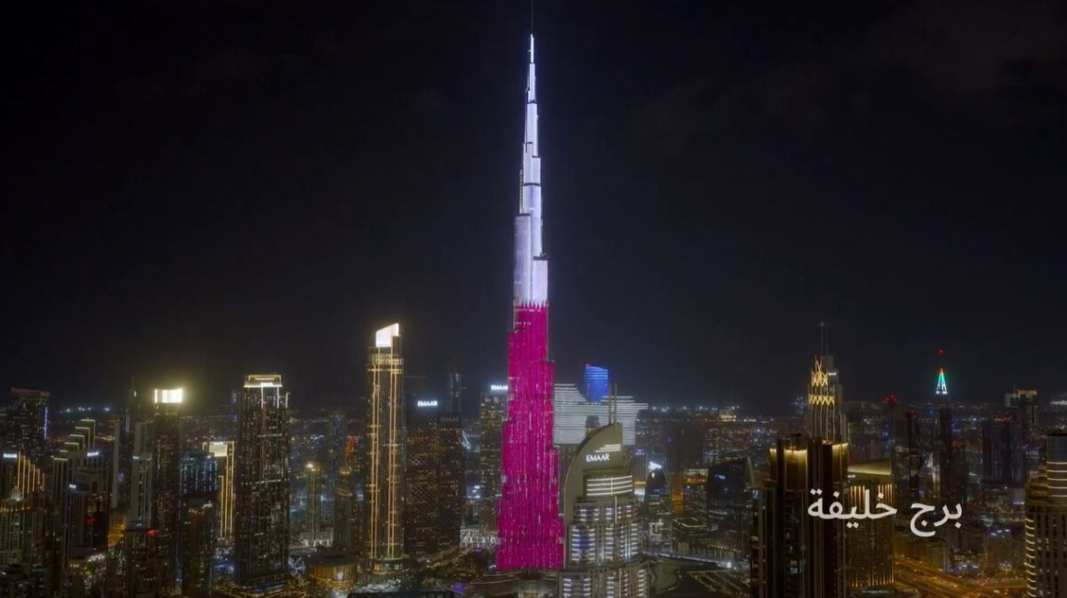Qatar National Day 2025 at Burj Khalifa Dubai Burj Khalifa illuminated in red and white during Qatar National Day 2025, showcasing iconic skyline visuals captured through cinematic video production in Dubai