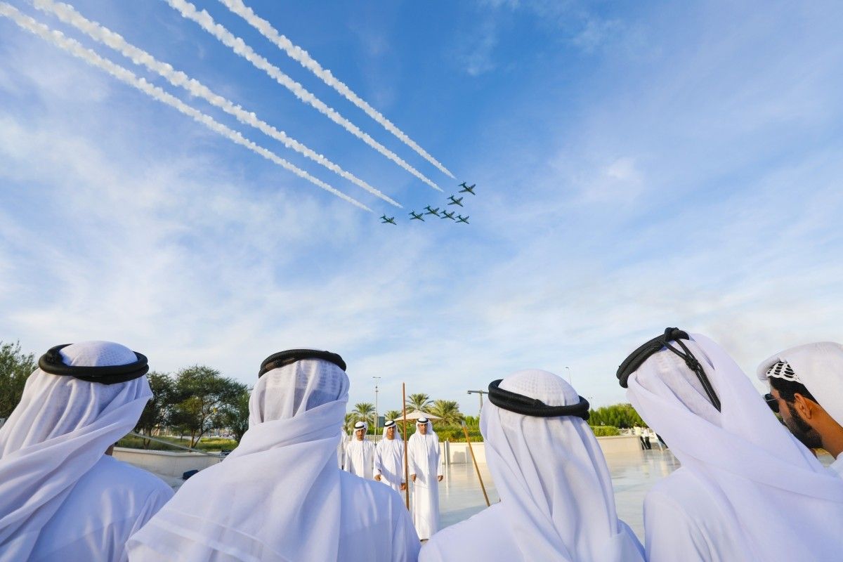 Outdoor Event Production & Photography Coverage Event Production and Photography Services capturing an aerial display ceremony with cultural gathering and large-scale outdoor event coverage