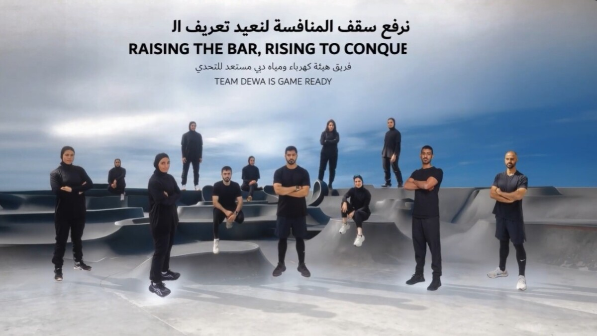 dewa_team_dubai_games_visual.webp DEWA team athletes standing united in Dubai Games training visual with motivational message and strong team presence